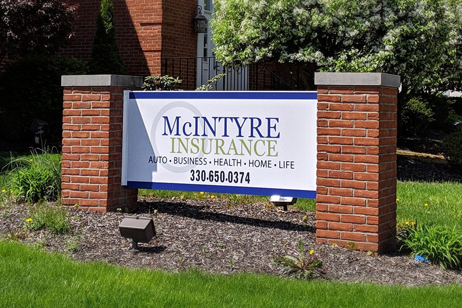 About - McIntyre Insurance Office Sign Closeup